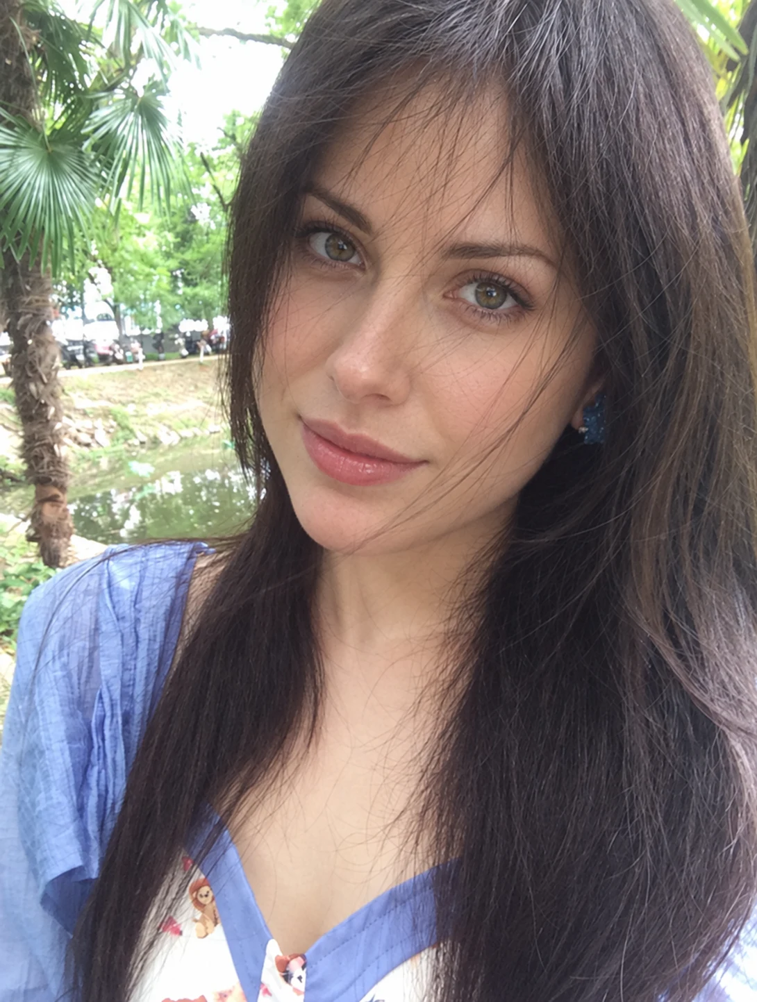 Close-up outdoor selfie used as a portrait reference