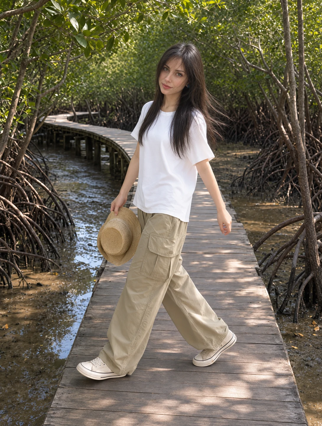 Full-body portrait on a wooded boardwalk