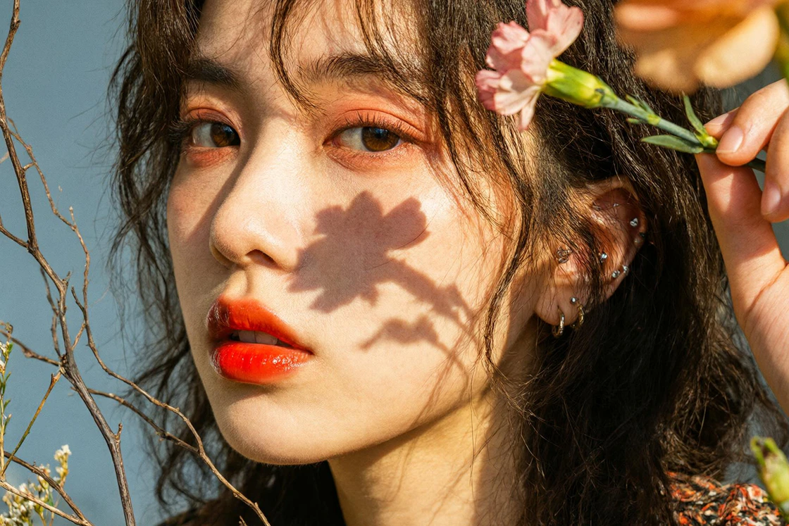 Official Qwen Image 3.0 close-up portrait showing detailed hair, skin, flowers, and natural shadows